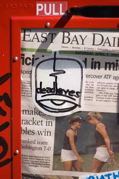 Sidewalk newspaper box in Oakland