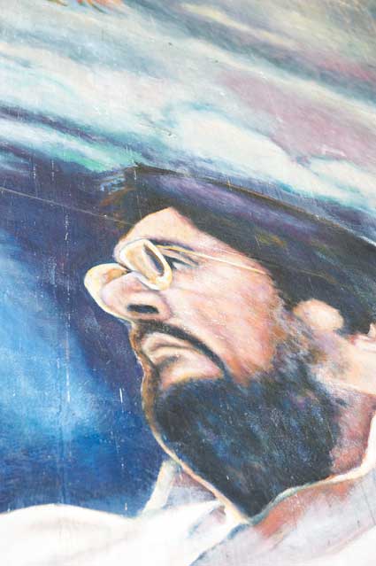 Portion of a mural under the Highway 580 overpass on Grand.