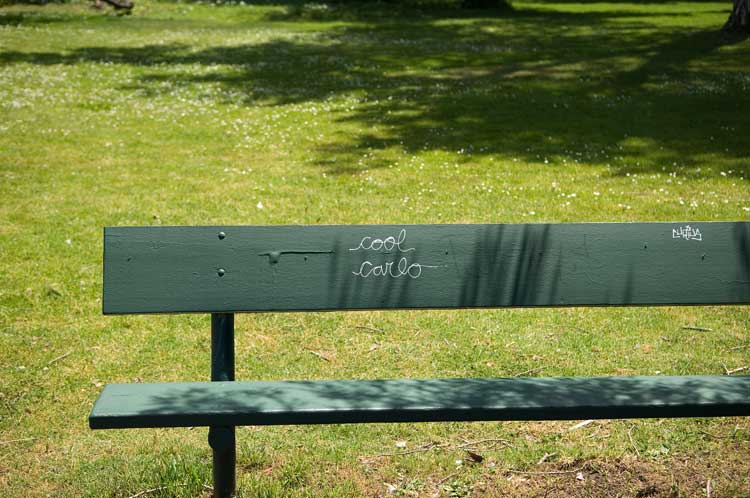 Graffiti on a bench near Lake Merritt, Oakland.