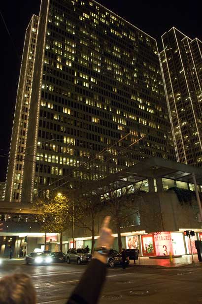 Flagging a cab last night in downtown San Francisco.