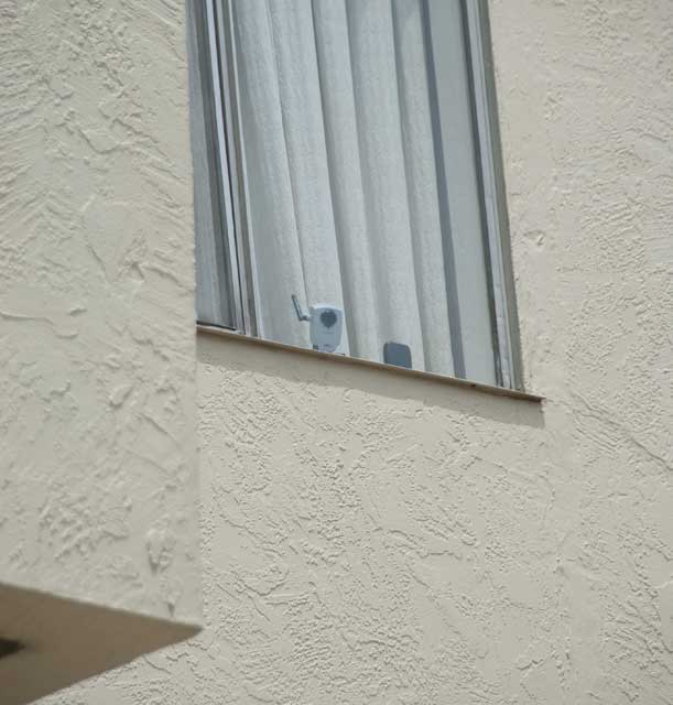 A video webcam in an apartment window in Oakland.