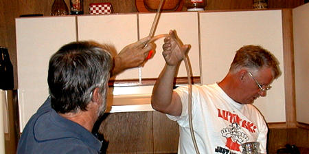 Buck and Cousin Denny making beer.