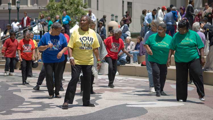 Dancing to a local blues band in front of City Hall.