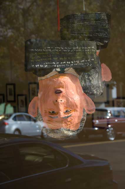 Through the window of an art studio near Grand Avenue and Broadway in Oakland.